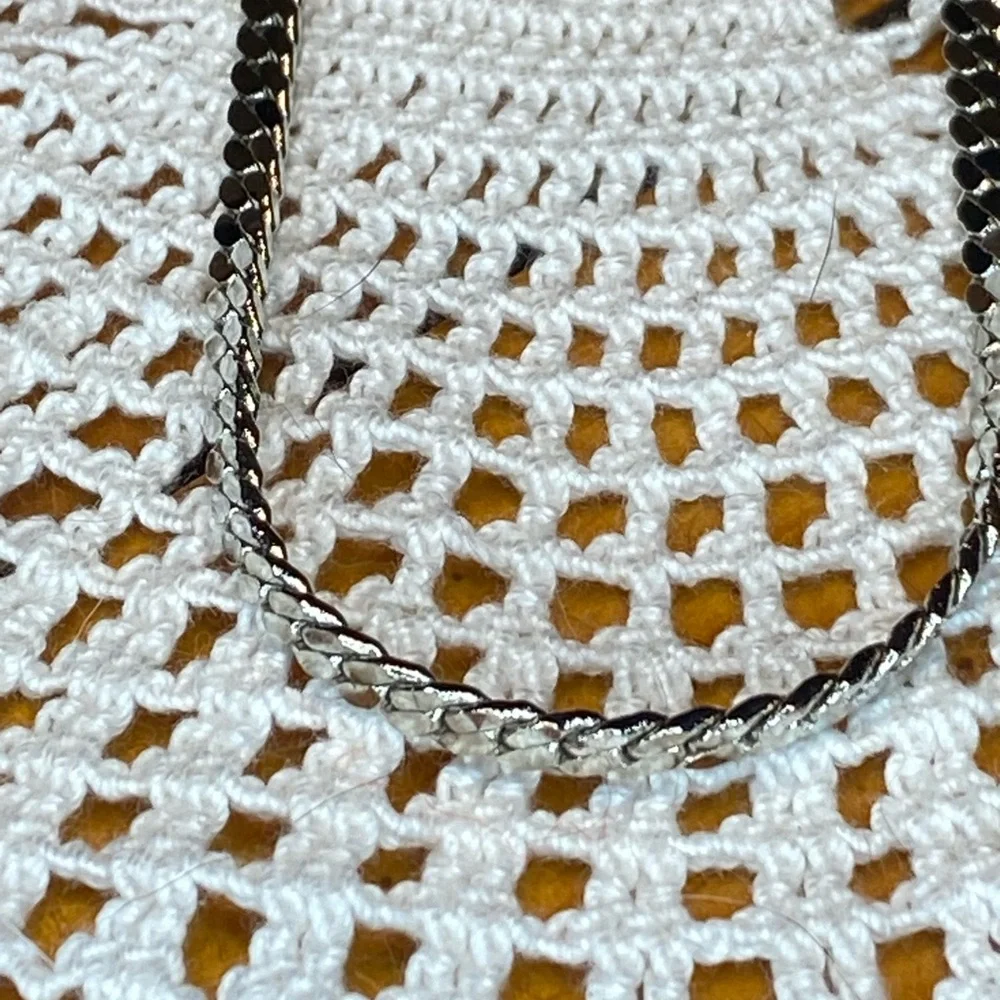 Intricate Silver Beaded Necklace with Symmetrical Design